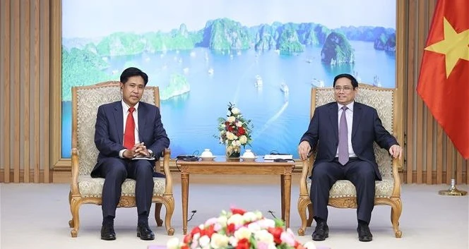 政府总理范明政会见老挝司法部部长帕维·西布阿利法