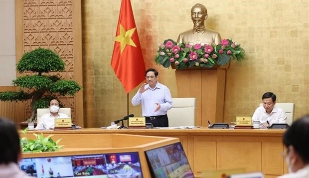 越南政府总理范明政：9月份越南国产新冠疫苗或将上市