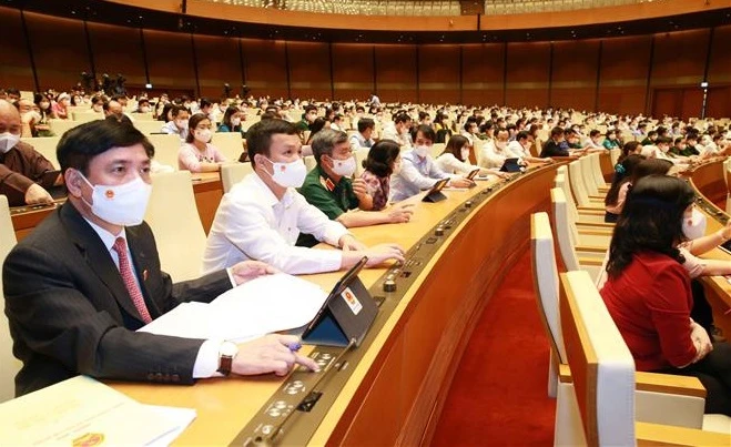 第十五届国会第一次会议：决定政府组成人员名额27人