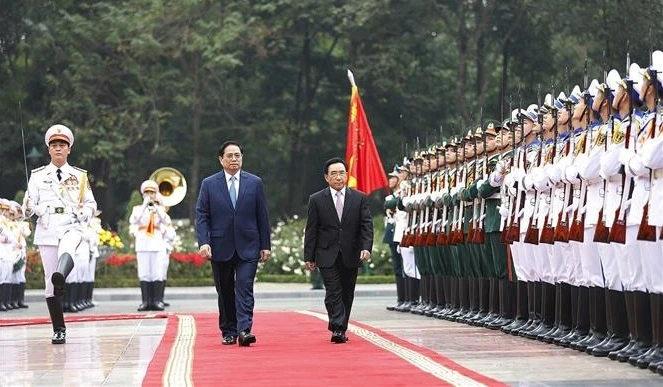 政府总理范明政主持仪式 欢迎老挝政府总理潘坎·维帕万访问越南