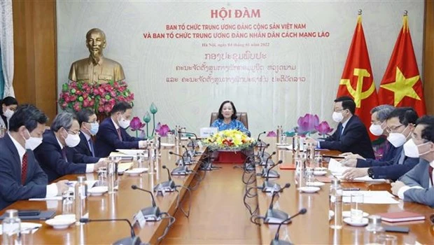 加强越老两国政党中央组织部的合作