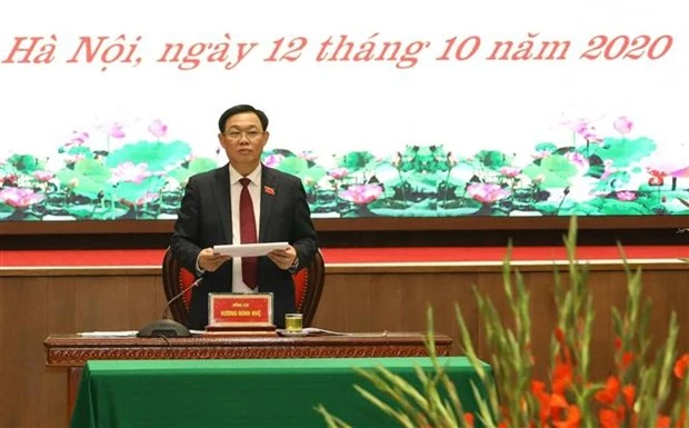 迎接党的十三大：王廷惠同志以100%赞成票再次当选河内市委书记