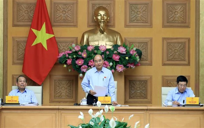 阮春福总理主持工资制度改革会议
