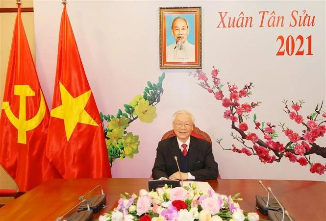 越共中央总书记、国家主席阮富仲与老挝人民革命党中央总书记通伦·西苏里通电话