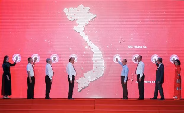 越南国家主席阮春福：爱心志愿活动是全社会的共同责任