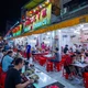 何尊权美食街于2023年12月底正式成立，街区内的商户大多是长期居住于此的华人家庭，以经营各类中华传统美食为主，并拥有悠久的传统历史。