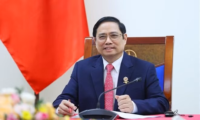 政府总理范明政与智利总统塞巴斯蒂安·皮涅拉通电话 ảnh 1