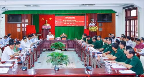 2015—2017年配合制度落实2年总结会议场景。（图片来源：越通社）
