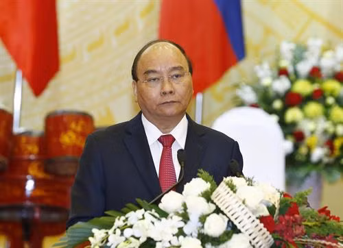 政府总理阮春福在招待会上发表讲话。(图片来源:越通社) 政府总理阮春福在招待会上发表讲话。(图片来源:越通社)