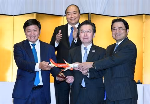 越南政府总理阮春福出席越南飞往日本三个直达航线开通仪式。（图片来源：越捷航空公司提供）
