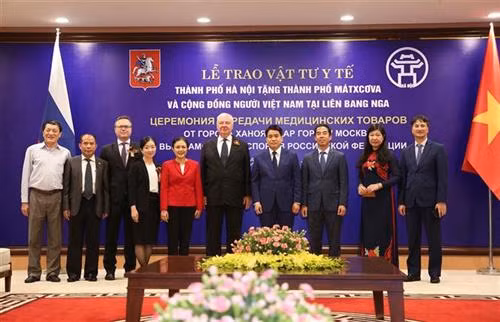 与会代表合影。图自越通社