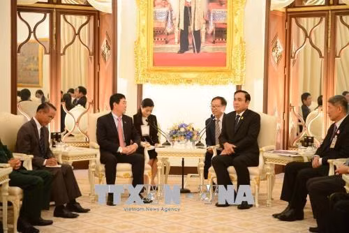 泰国总理巴育•占奥差会见越南驻泰国特命全权大使阮海鹏。（图片来源：越通社）