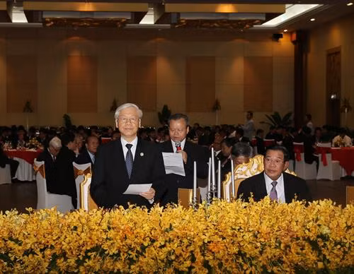 阮富仲在宴会上致辞。（图片来源：越通社）