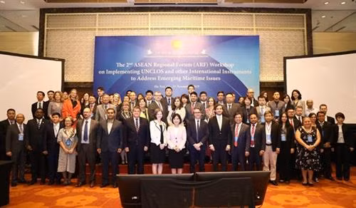 与会代表合影。图自越通社