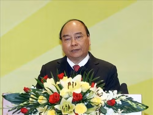 越南政府总理阮春福发表讲话。图自越通社