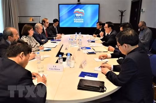会见场景。图自越通社