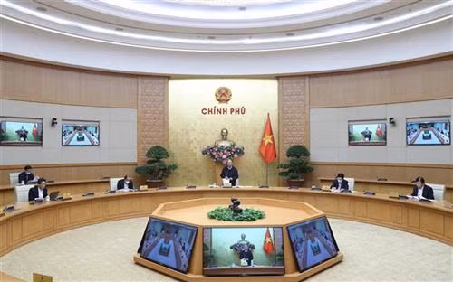 政府总理阮春福在会议上发表讲话。图自越通社 政府总理阮春福在会议上发表讲话。图自越通社