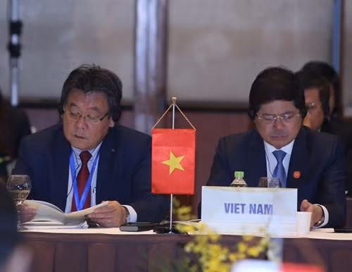 越南代表团成员。图自越通社