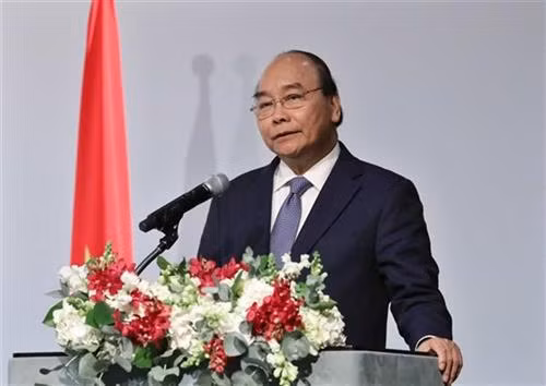 阮春福在论坛上发表讲话。图自越通社