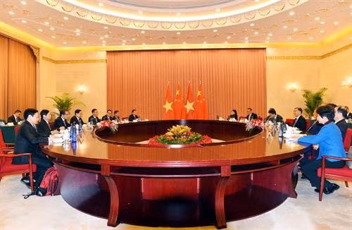 会谈场景。 图自越通社
