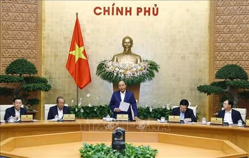 阮春福发表讲话。图自越通社