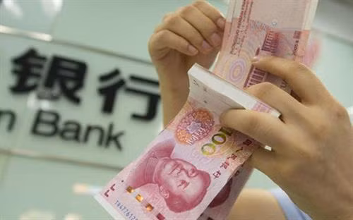 10月25日越盾兑美元汇率稳定 人民币汇率下降。图自越通社