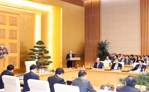 会见回国出席2018年越南改革创新网络对接活动的科技创新领域越侨人才。 越通社记者 统一 摄
