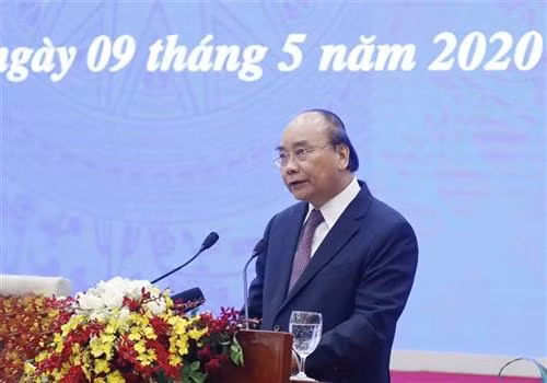 阮春福在会上发表讲讲话。图自越通社