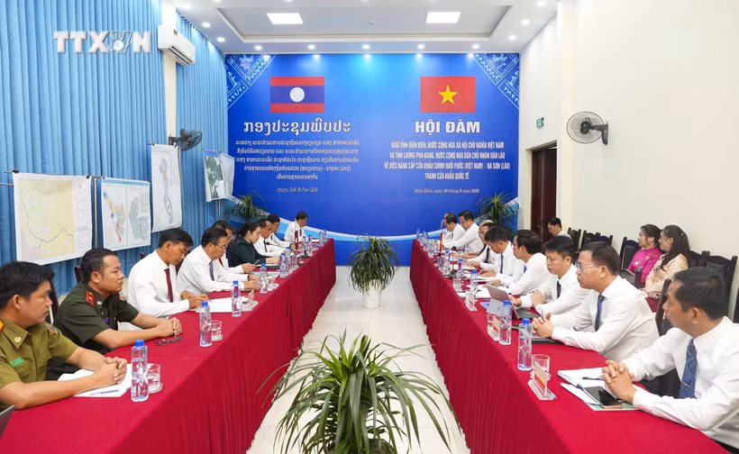 双方会谈现场。图自越通社