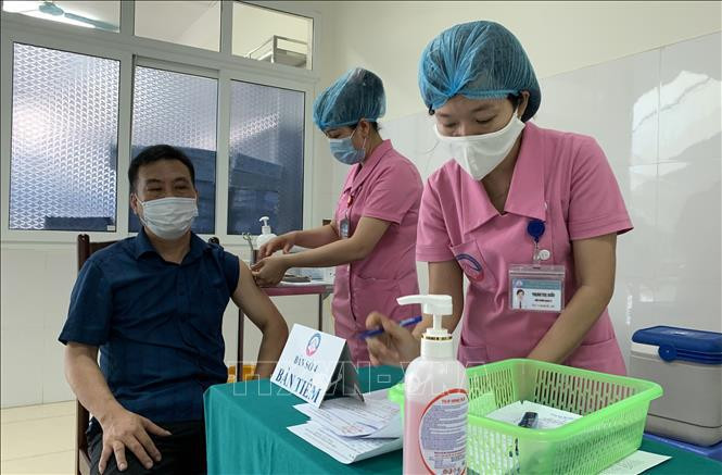 越南累计新冠疫苗接种人数585539人 ảnh 1