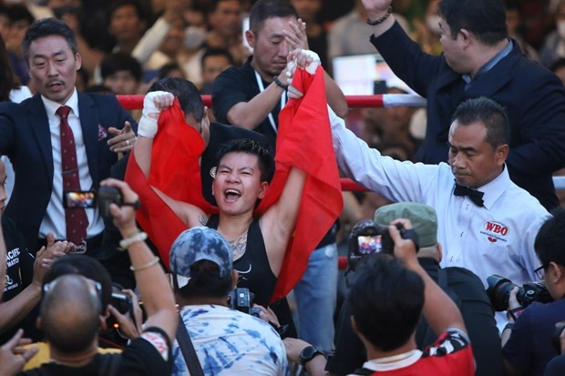 越南女拳手阮氏秋儿去年2月份夺得WBO亚太区金腰带。图自青年报 越南女拳手赴韩国争夺WBO世界金腰带 ảnh 1