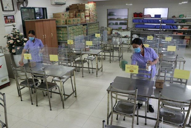 海阳省企业既要防控疫情又要恢复运营。图自越通社 海阳省企业既要防控疫情又要恢复运营 ảnh 2