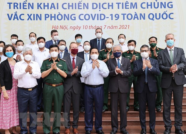 越南政府总理范明政：许多人希望优先为疫情重灾区进行新冠疫苗接种 ảnh 2