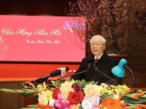 阮富仲总书记给河内市委、市政府和首都人民拜年 ảnh 1