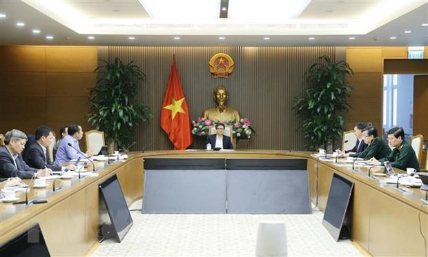 会议场景。图自越通社 越南预计于2021年第三季度末推出国产疫苗 ảnh 2