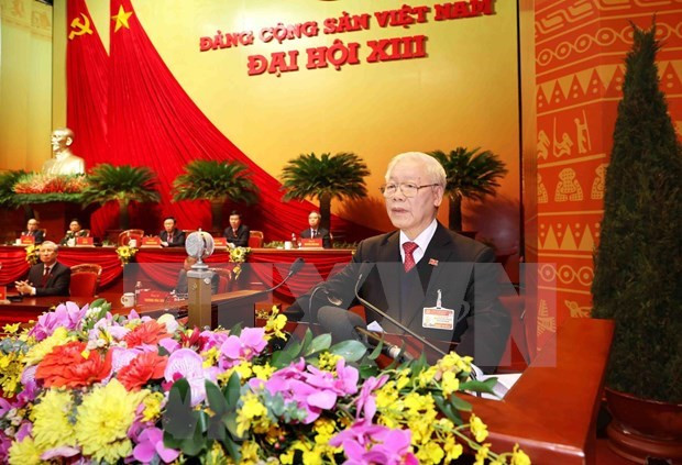 阮富仲在会议上发表讲话 图自越通社 越共中央总书记阮富仲在越共十三大闭幕会上致辞 ảnh 2