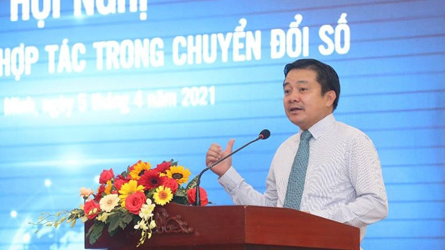 VNPT代理总经理黄光廉在会议上发表讲话。图自越通社 越南助力中小企业实现数字化转型 ảnh 1