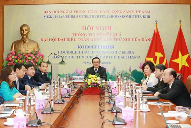 会议场景。图自越通社 越共中央对外部向圣彼得堡市政府通报越共十三大重要成果 ảnh 1