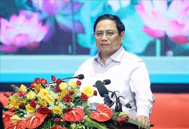 政府总理范明政：寻找和收集烈士遗骸不仅是责任更是发自内心的命令 ảnh 1