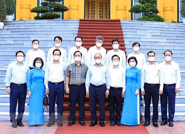 国家主席阮春福: 纺织服装业是疫情后助推经济复苏的拳头产业 ảnh 2