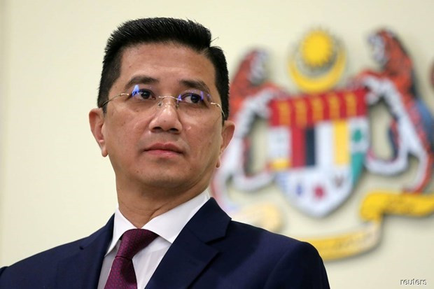 马来西亚国际贸易及工业部(MITI)部长阿兹敏·阿里。图自路透社 马来西亚内阁呼吁优先考虑国家及民众的利益 ảnh 1