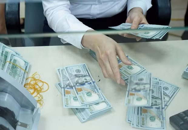 28日上午越盾对美元汇率中间价小幅下降 ảnh 1