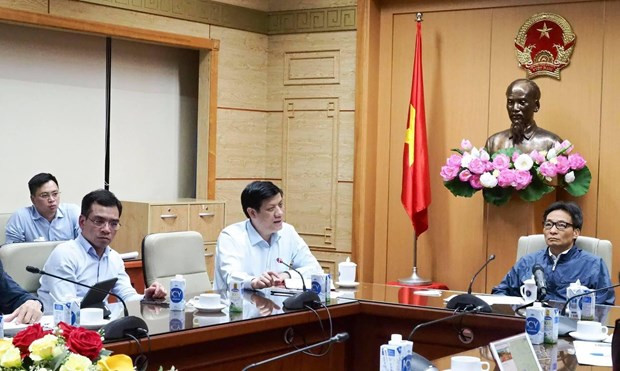 政府副总理武德儋指导海阳省高度集中精力,努力在10年内彻底进行疫区划分工作。卫生部供图 越南新增两例本地确诊病例 立即主动采取强有效防控措施控制住疫情 ảnh 2