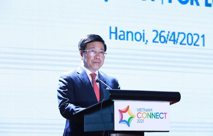 越南政府副总理范平明发表讲话。图自越通社 越南——外国投资商颇具吸引力的安全投资目的地 ảnh 2