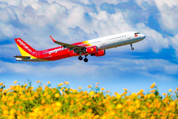 越捷航空推出零盾起机票 旅客回家路不再遥远 ảnh 1