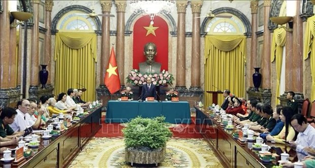  越南国家主席阮春福：全社会需要参与革命有功者关爱工作 ảnh 1