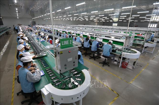 越南已将其国内生产总值 (GDP) 的 6% 左右投资于基础设施建设,这是东盟地区投资水平最高的国家之一。图自越通社 外国媒体点名助力越南经济稳定增长的三大因素 ảnh 2