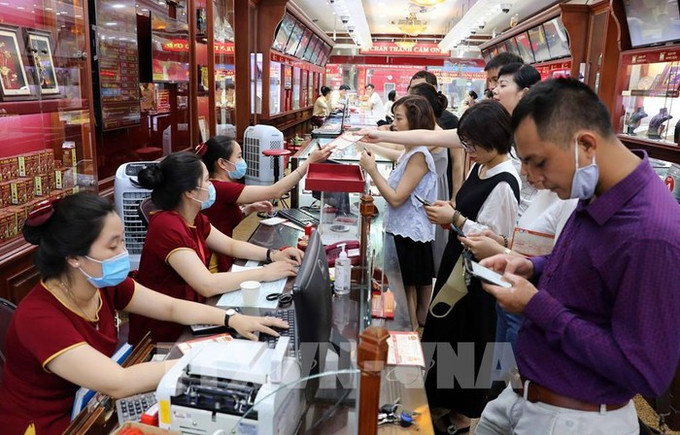 附图 。图自越通社 越南国家银行有足够的资源来维持黄金市场稳定 ảnh 1