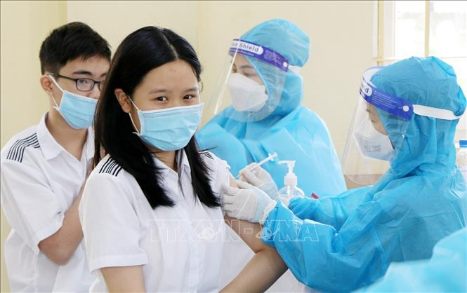 附图 图自越通社 越南卫生部就为 12-17 岁人群接种第 3 剂新冠疫苗颁布通知 ảnh 1