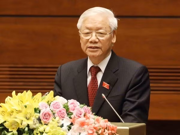 越南领导人致电祝贺老挝国庆45周年 ảnh 1